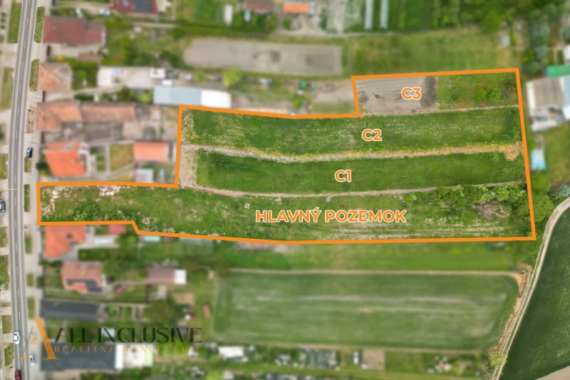 Aerial view of residential plots in the town of Veľké Úľany, divided into three sections.