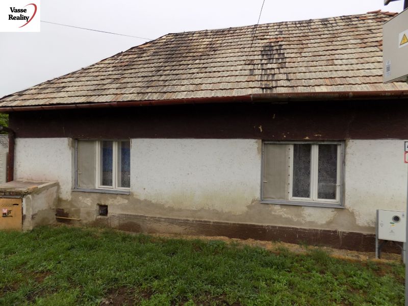 A family house on Gbelce Street in Gbelce with a simple exterior and a gable roof.