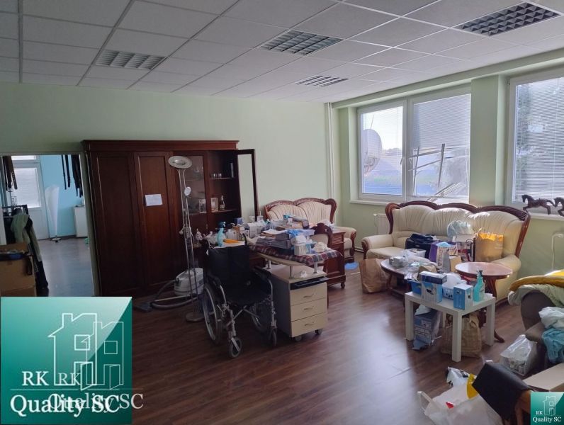 Interior with a sofa set and wooden decor flooring in warehouses and halls.