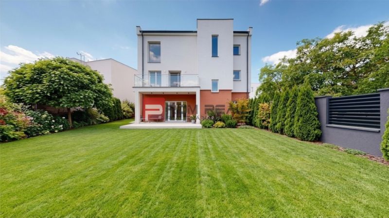 A family house on Sládkovičova Street in Modra with a landscaped garden and terrace.
