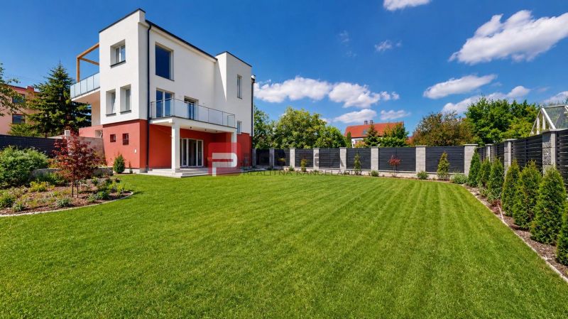 A family house on Sládkovičova Street in Modra with a large well-maintained garden and terrace.