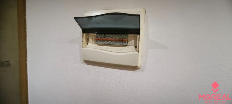 An electrical panel on the wall in a 3-room apartment.