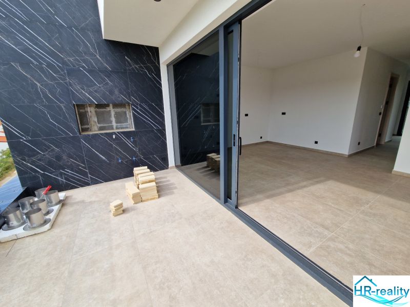 A recreational apartment in Stara Novalja with a terrace, ceramic tiles, and a spacious interior.