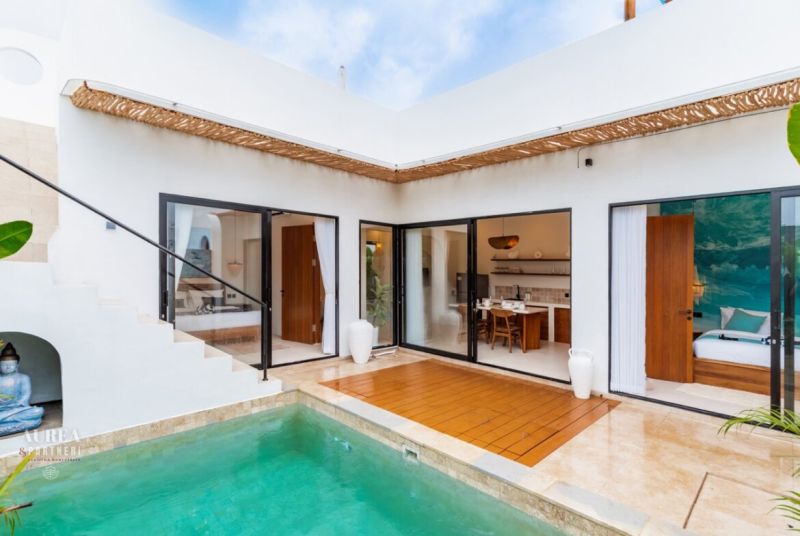Villa in Bali with a terrace, pool, and spacious interior.