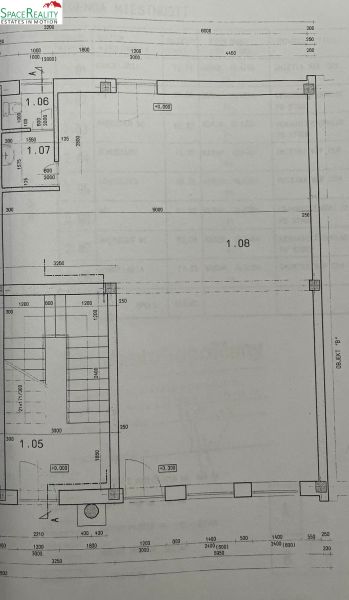 Floor plan of the building with details of rooms and staircase.