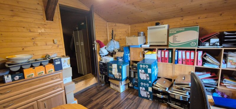 Wooden interior with storage space and flooring with wood decor in commercial premises.