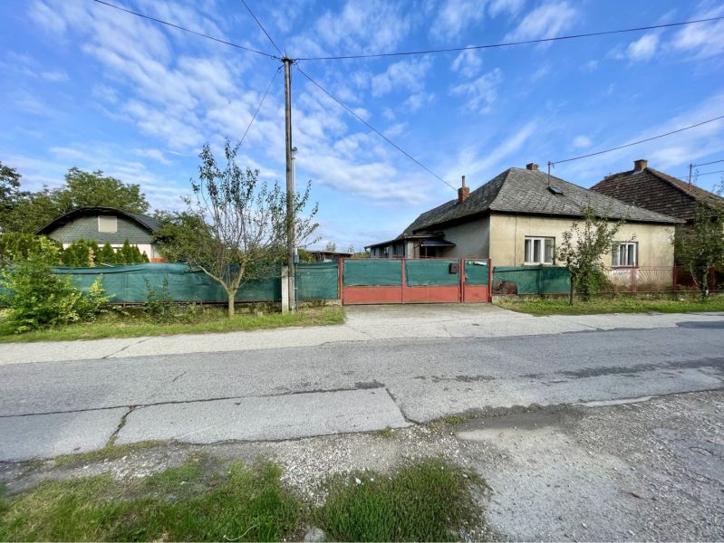 Family house in Jahodná, Residential land, with fencing and access road.