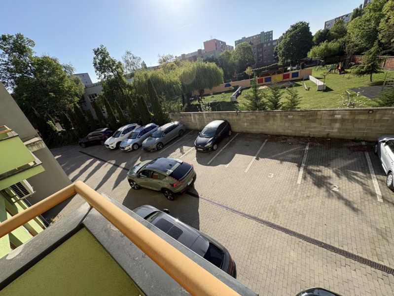 Parking lot at a 3-room apartment on Galantská Street in Dunajská Streda with a view of the playground.