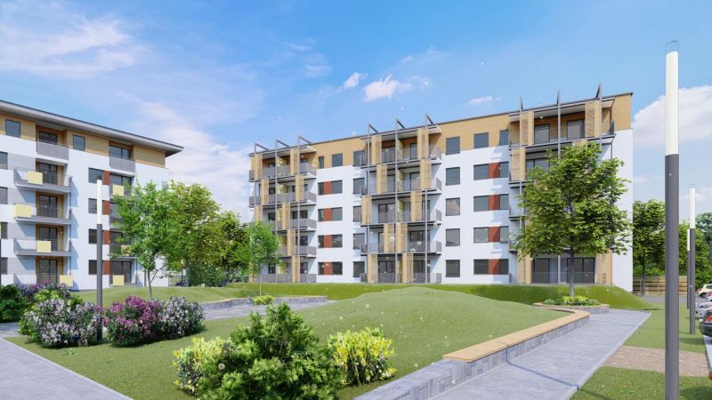 Apartment building with greenery on the street in Dunajská Streda in front of a 2-room apartment.
