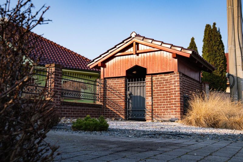 Brick and wood entrance gate to a family house in Dolný Bar.