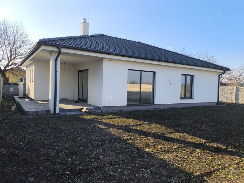 A family house in Michal na Ostrove with a terrace and a garden behind the house.
