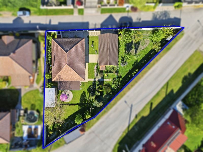 A family house with a yard and garden in Kostolné Kračany, visible from the air.
