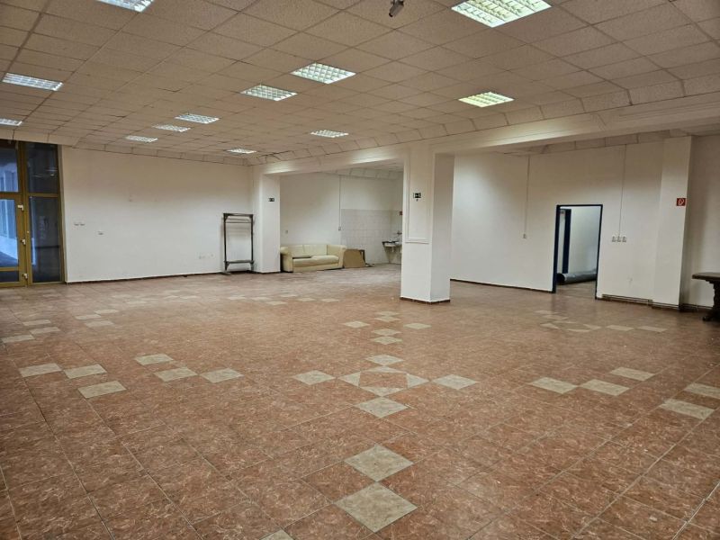 Spacious commercial spaces with tiling and seating.