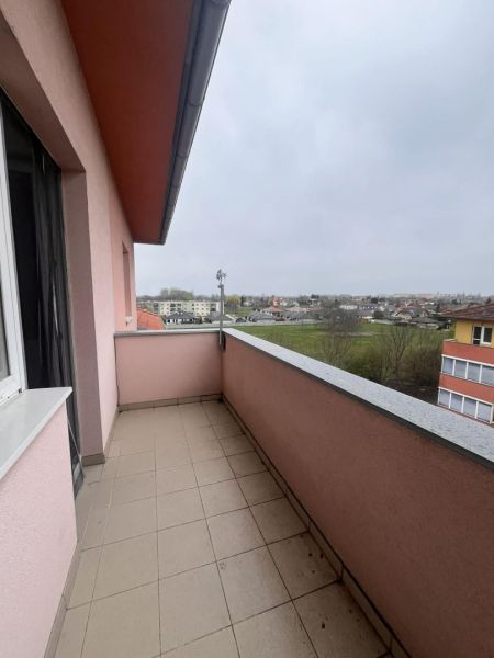 A balcony with a view of the surrounding buildings in a 3-room apartment in Dunajská Streda.