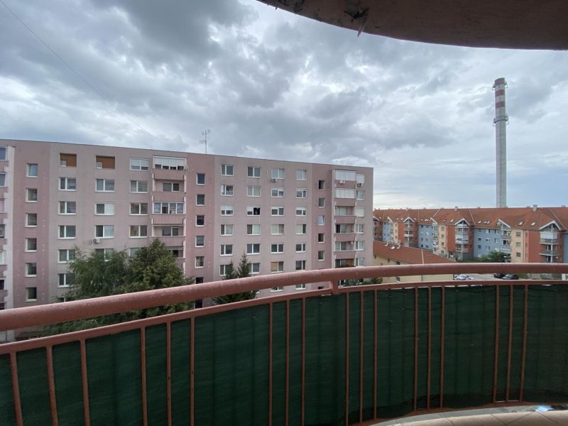 View from the balcony of a cloudy sky and a housing estate in Dunajská Streda.