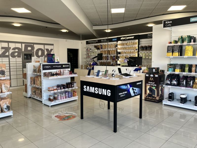 Retail spaces with electronics, cosmetics, and coffee, wooden decor flooring.