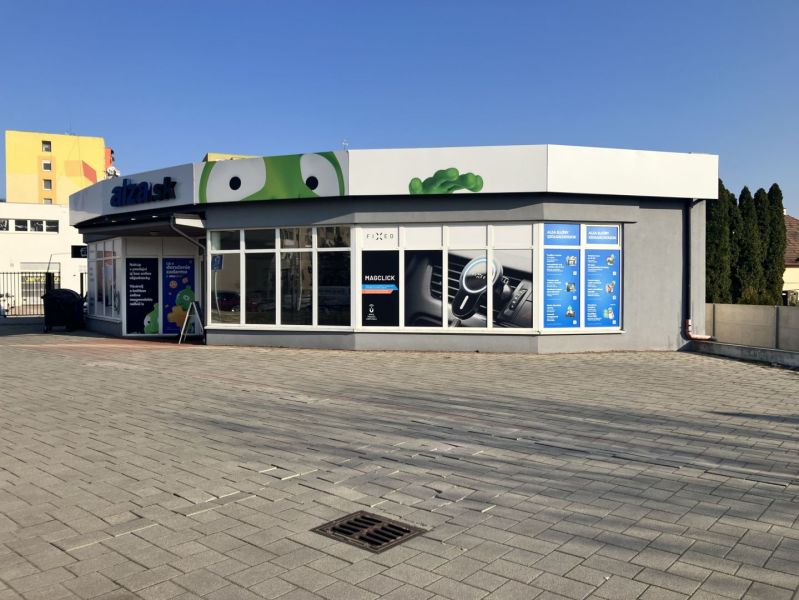 Commercial premises in Dunajská Streda with a modern exterior and large glass display windows.