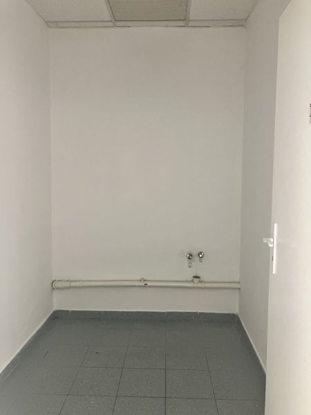 White walls and tiles in commercial spaces, ready for customization.