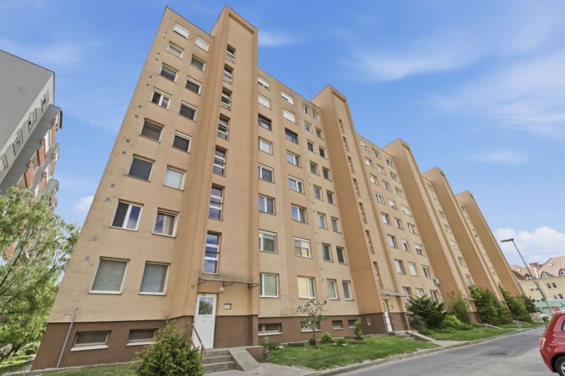 High-rise residential building with multiple balconies in Dunajská Streda.