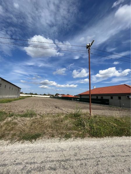 Holice offers a view of plots - living with a blue sky and houses.