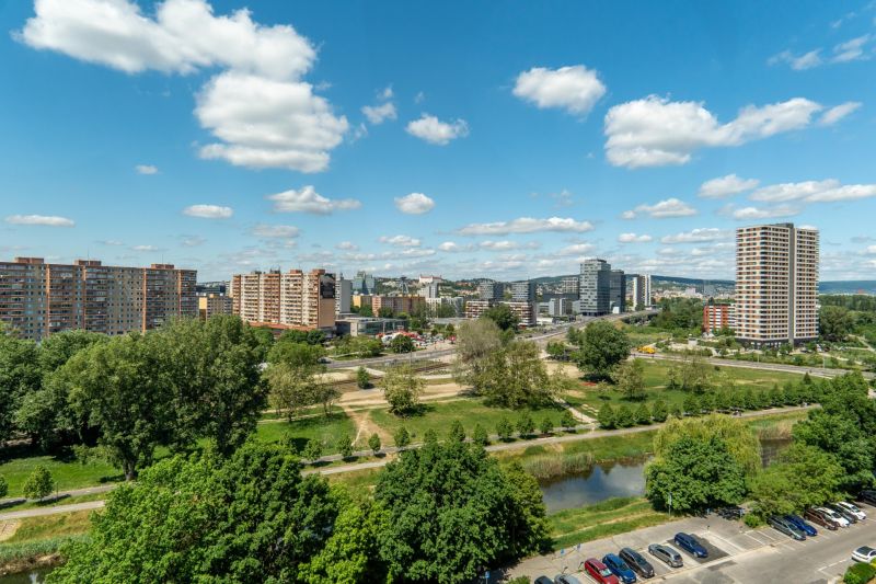Bratislava - Petržalka, Lachova Street, display of 3-room apartments among greenery and a small river.