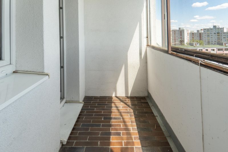 A balcony with ceramic tiles in a 3-room apartment on Lachova Street in Bratislava - Petržalka.