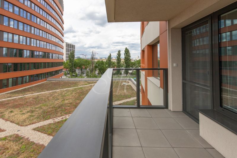 The balcony of a 2-room apartment on Súkennícka Street in Bratislava - Nivy with a view.