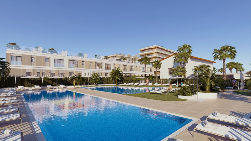 Apartments with a pool and palm trees in El Puig. A relaxing atmosphere for comfortable living.