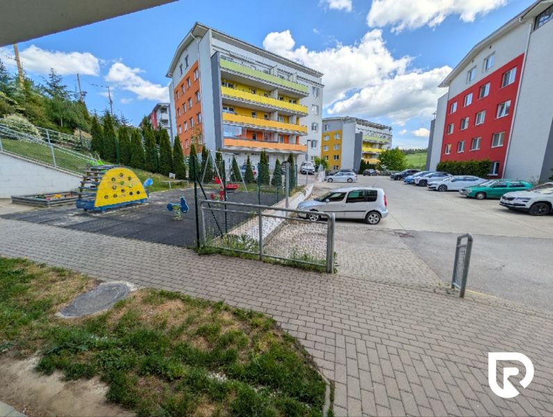 Playground and parking lot on Mateja Bela Street in Žilina near a 2-room apartment.