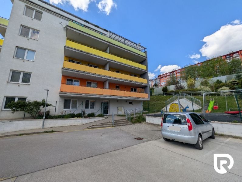 Apartment building on Mateja Bela Street in Žilina, next to the parking lot and playground.