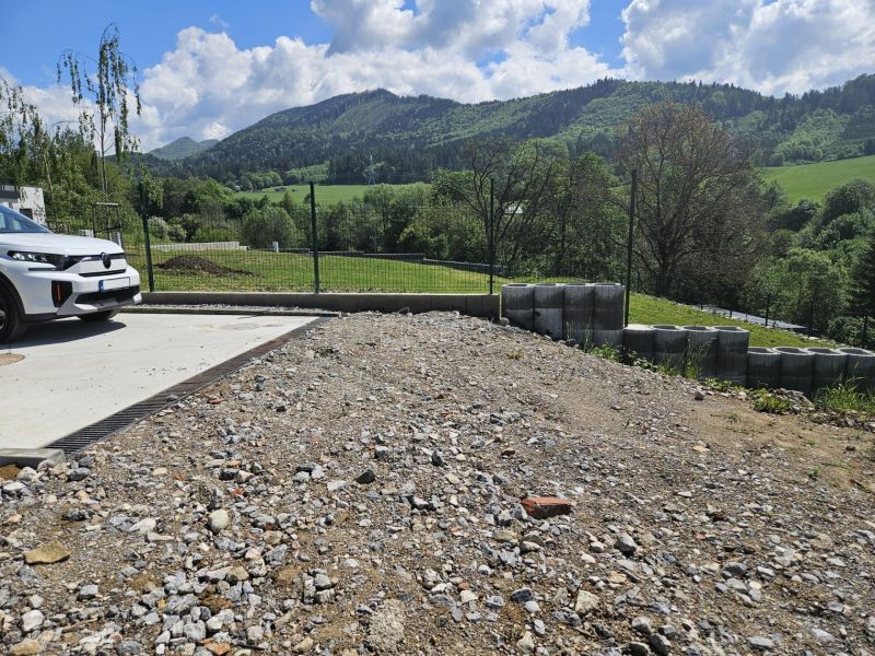 Plots - housing in the village of Varín on Rozbehov Street with a view of nature.