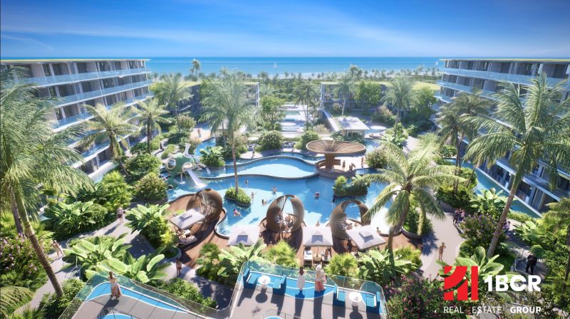 Apartment construction in Phuket with a swimming pool, palm trees, and a sea view.