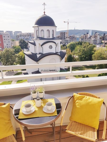 View from the balcony to the church in Bratislava – Ružinov on Tomášikova Street.
