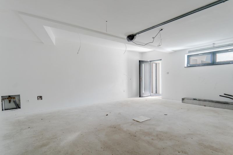 Empty room with a white wall, balcony door, and window, Family house.