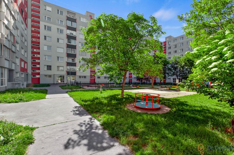 The courtyard on Vŕbová Street in Bratislava - Vrakuňa with a playground near a 2-room apartment.