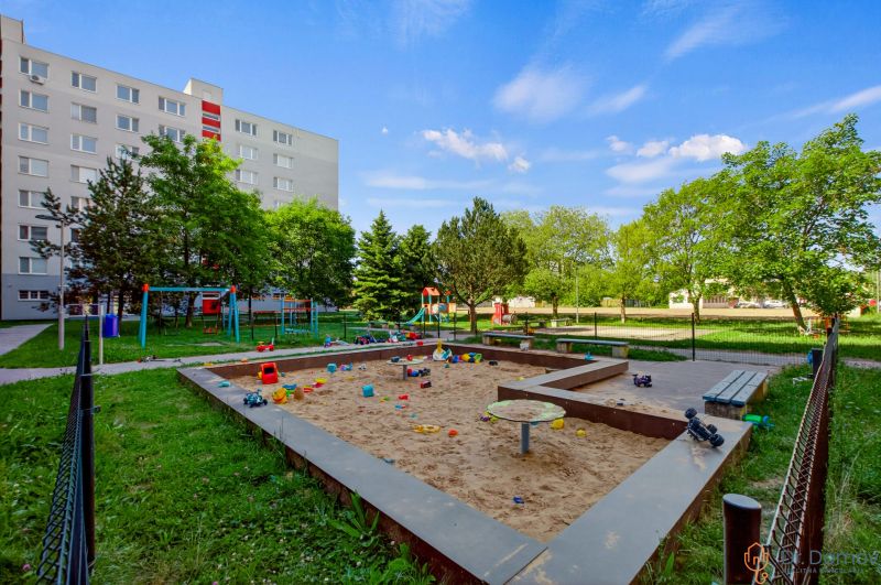 Playground with a sandbox near the apartment building on Vŕbová Street, Bratislava - Vrakuňa.