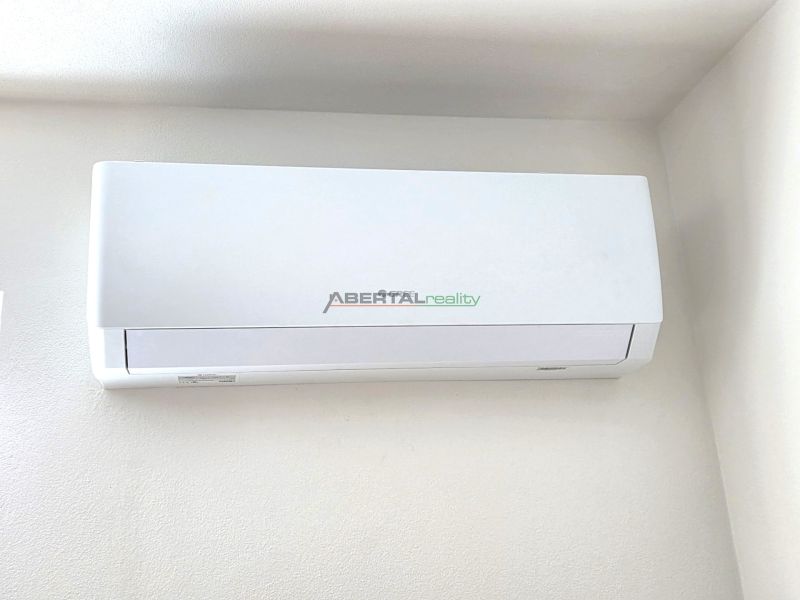 Wall-mounted air conditioning in a 2-room apartment provides optimal temperature and comfort.