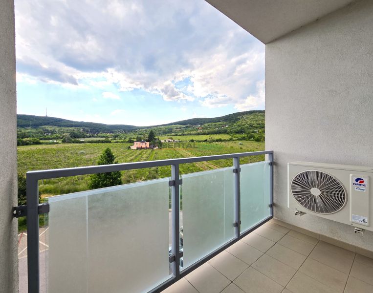 A balcony with a view of greenery in the Bratislava - Nové Mesto area on Jurská Street.