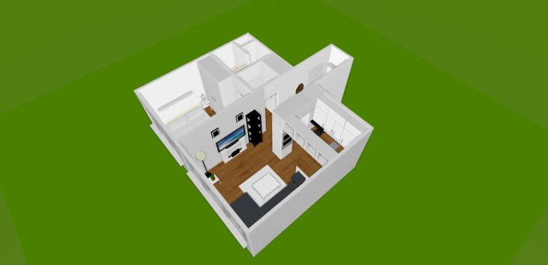 Design of a 2-room apartment with a wooden decor floor and an open interior layout.