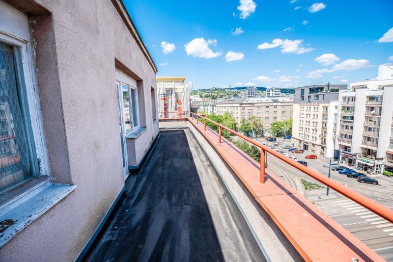 A balcony with a view of Krížna Street in Bratislava - Staré Mesto, at a 2-room apartment.