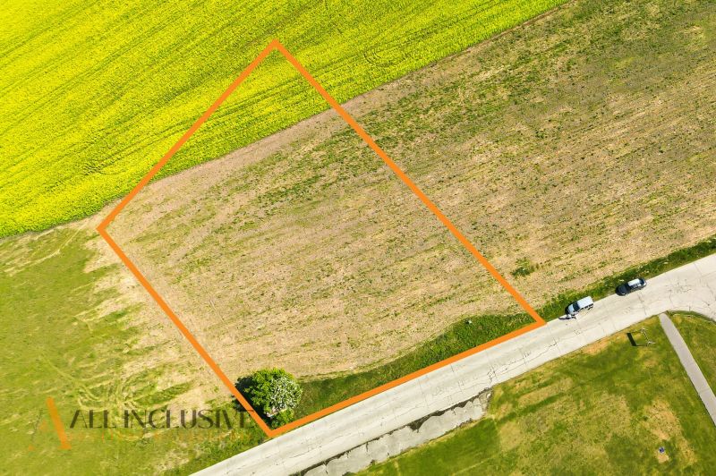 Land in Mliečany, Dunajská Streda, surrounded by greenery, ideal for living.