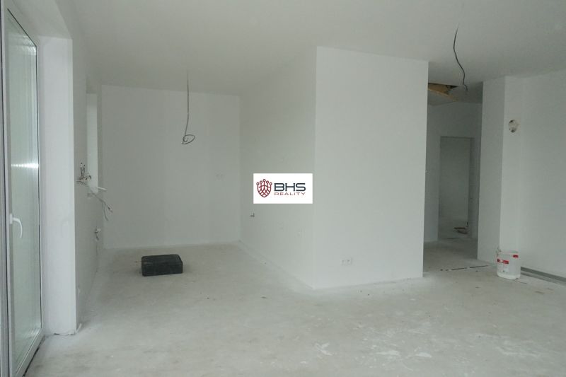 Interior of a family house with an empty room and preparation for electrical installation.