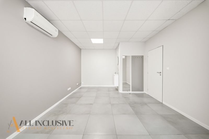 Bright commercial spaces with air conditioning and ceramic tiles on the floor.