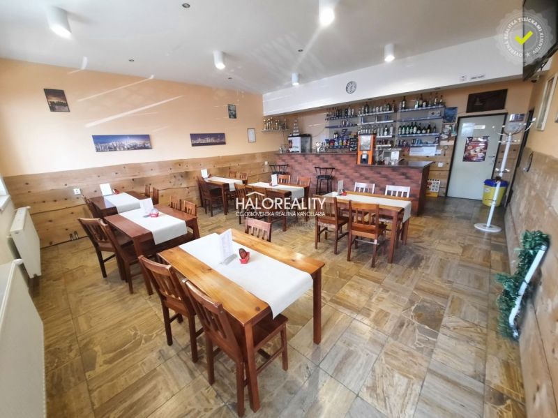 Gastro premises with a bar and wooden furniture, floor with wooden decor.