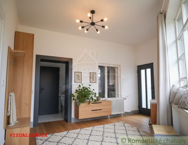 A cottage with a wooden decor floor, curtains, and a plant in the interior.