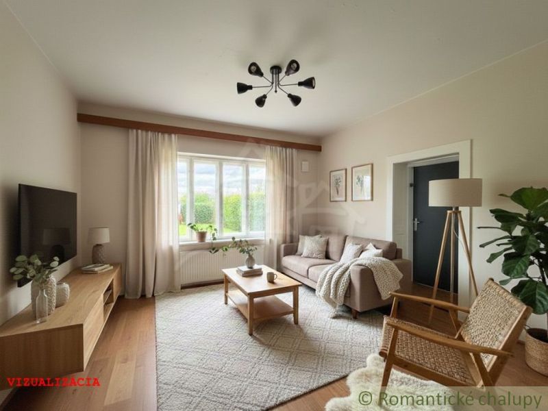 Living room in a cottage with a comfortable gray sofa and a wooden decor floor.