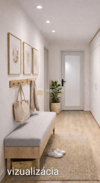 A hallway with a bench, decoration, built-in wardrobes, and a floor with a wooden decor in a 3-room apartment.