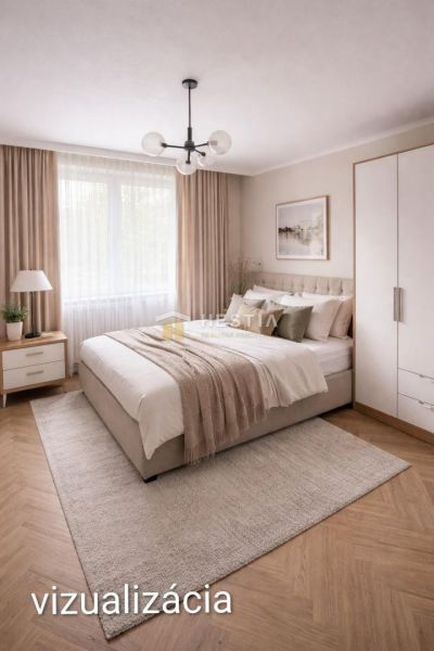 A bedroom in a 3-room apartment with a comfortable bed and a floor with a wooden decor.