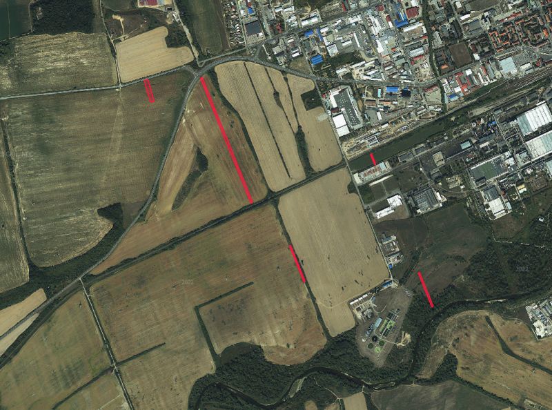 Aerial view of agricultural and forest land near Humenné with a part of the industrial zone.