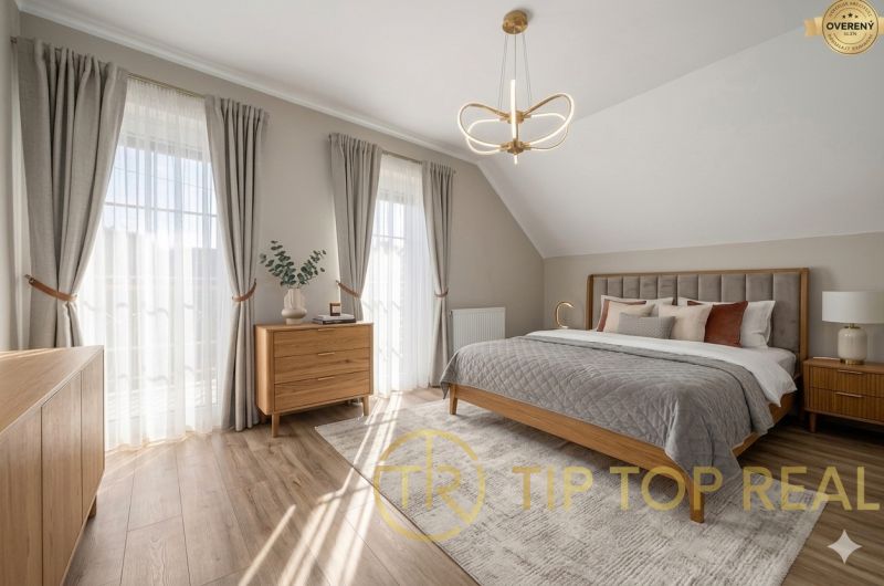 A bedroom with wood-patterned flooring, stylish curtains, and modern lighting in a family house.